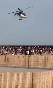 Senior skip day at Jones Beach ends in chaos as police helicopter descends on brawling horde of high schoolers: video